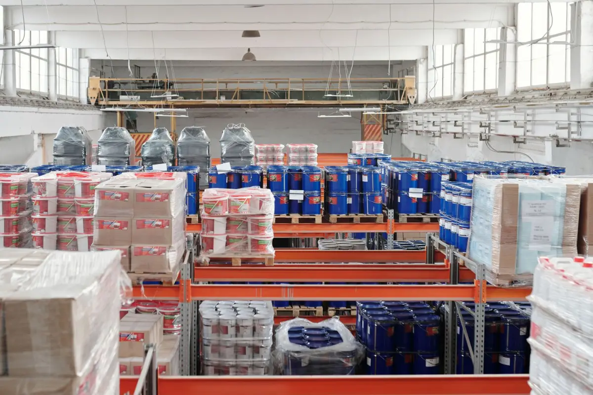 Warehouse interior with racking and palletised goods